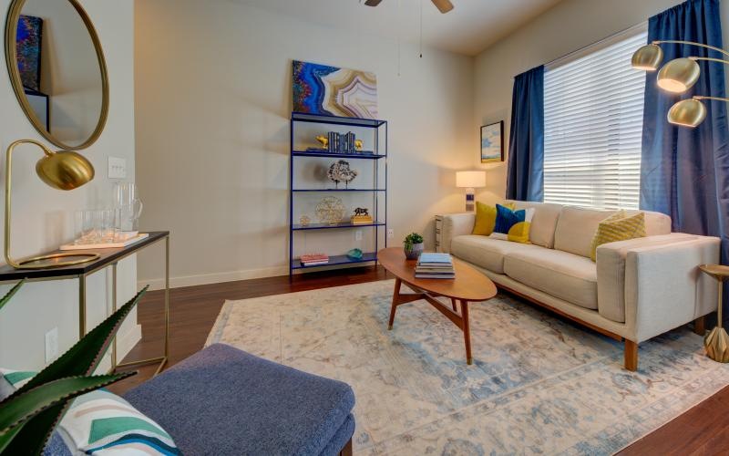 a living room with a couch and a table