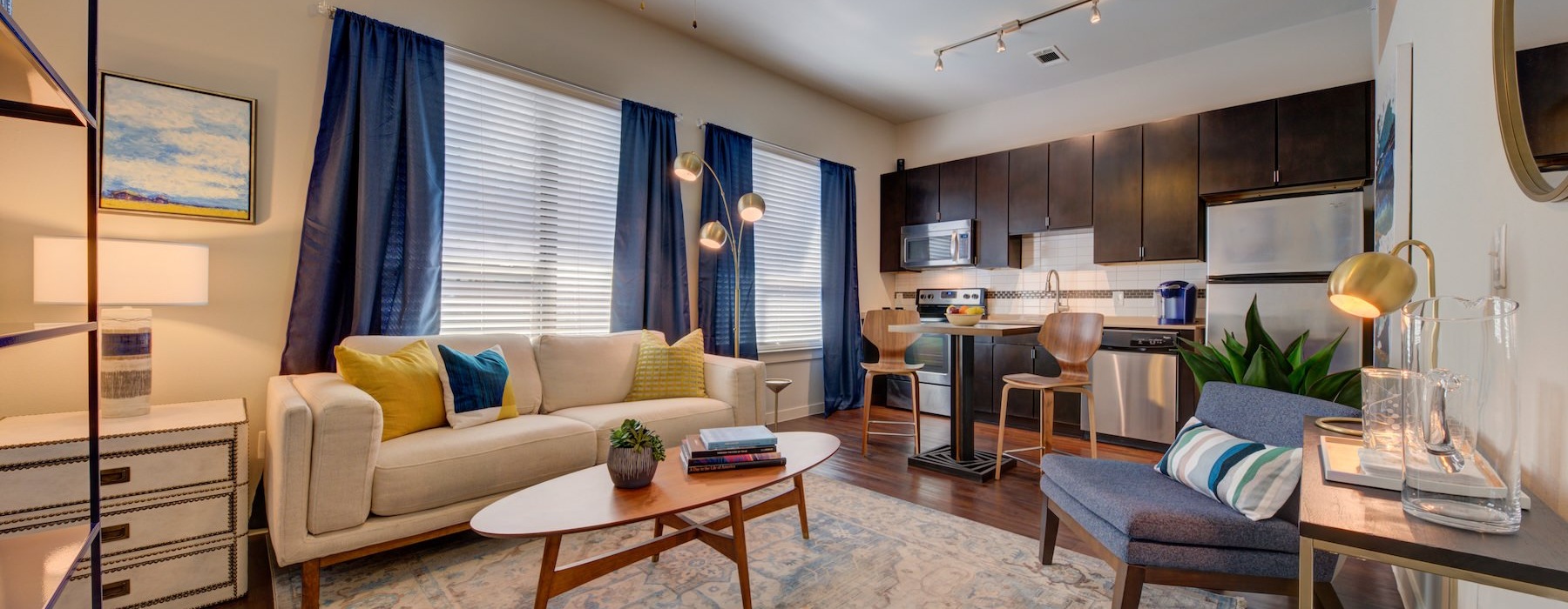 a living room with a couch and a table